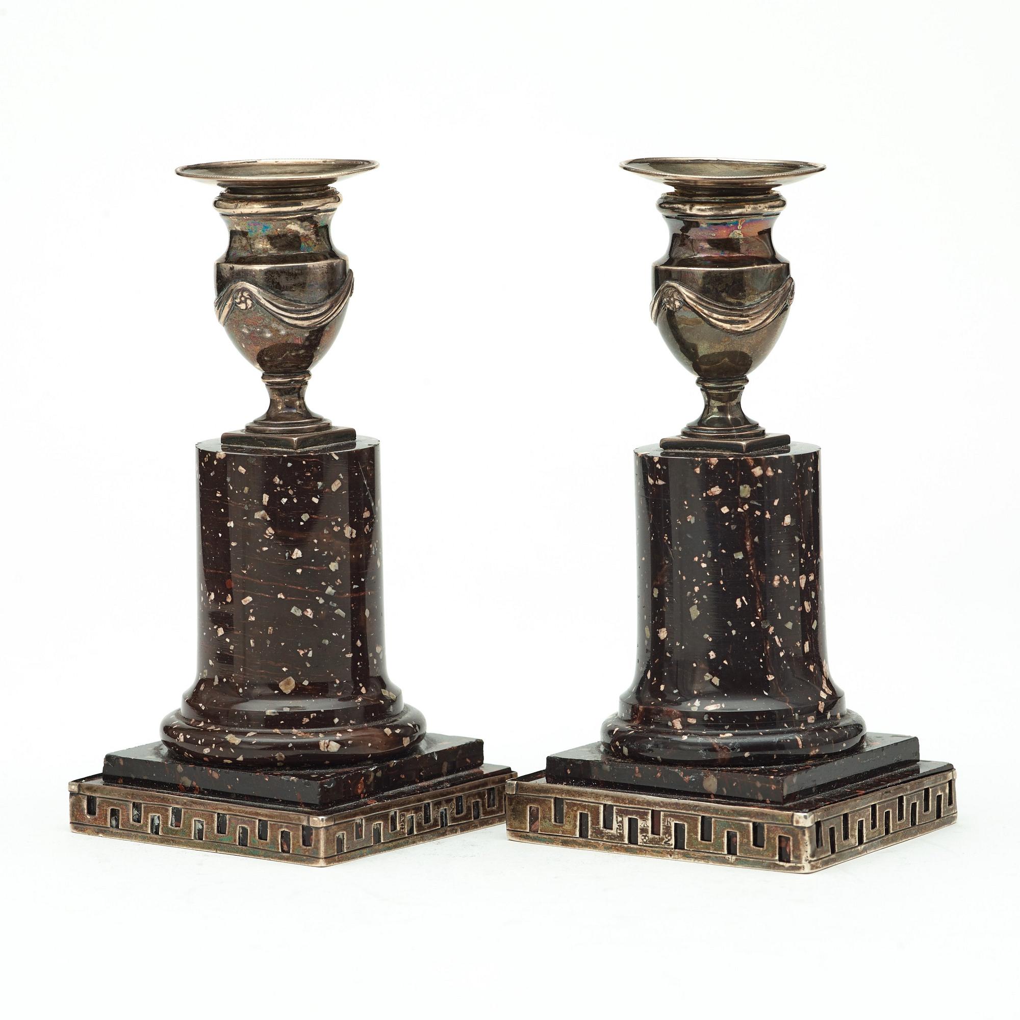 A pair of porphyry and silver candlesticks by Anders Christian Levon, Åbo 1799.
