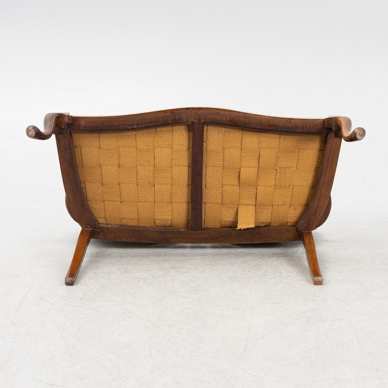 An Art Nouveau sofa, circa 1900.