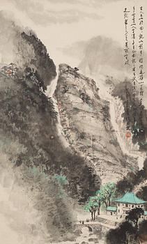 1441. Zhang Renzhi, A hanging scroll of a rocky landscape with a river valley and house, signed.