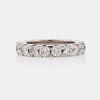 1267. An eternity ring, set with brilliant-cut diamonds. Total carat weight 3.24 cts. 18 x ca 0.18 ct.