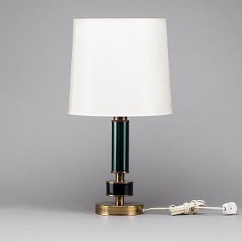 A BRASS AND GLASS TABLE LAMP, second half of the 20th century.