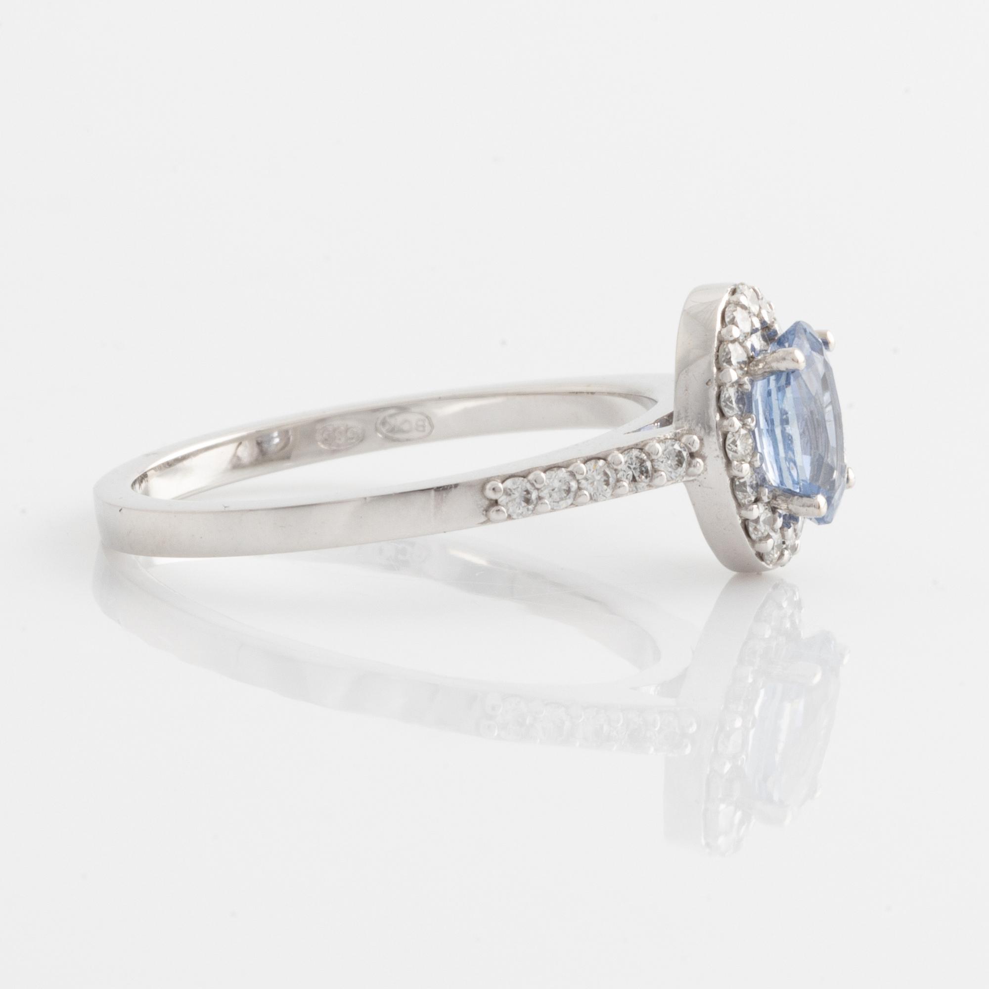 Ring with oval sapphire and brilliant-cut diamonds.