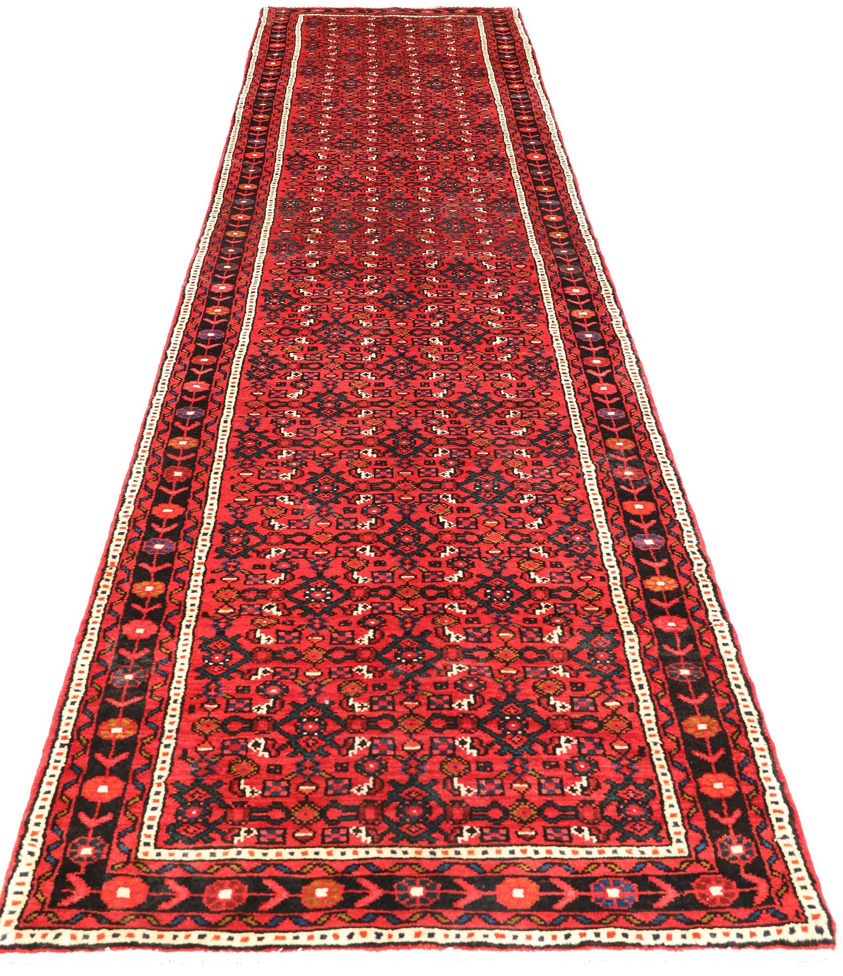 A Hosseinabad runner, c 414 x 95 cm.