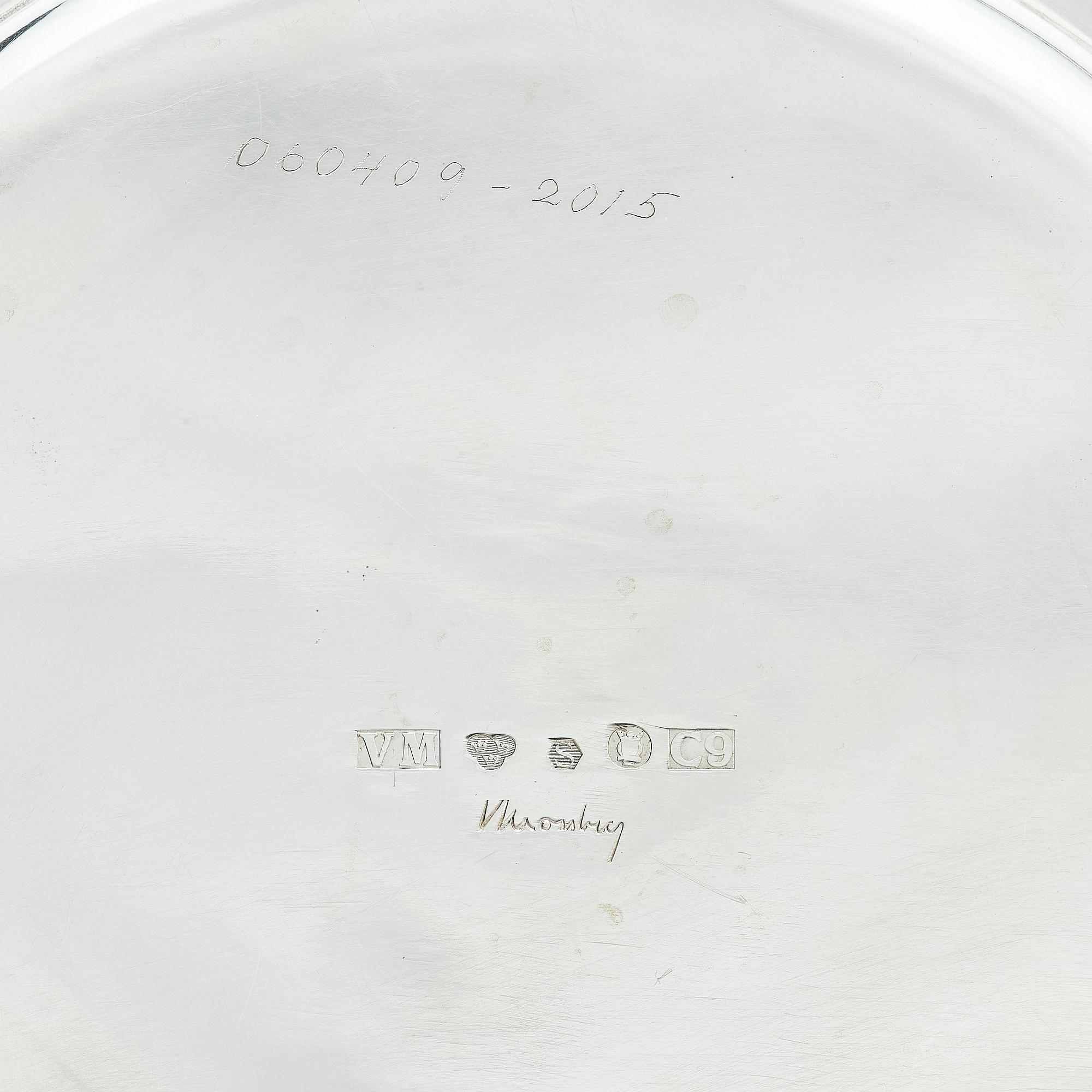 Victor Mossberg, a set of twelve silver plates, Stockholm, 1953-55.