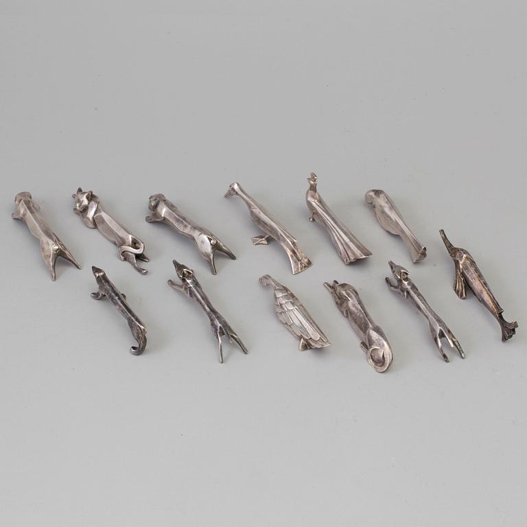 12 silver plated animal-shaped knife rests designed by Marcel Edouard Sandoz for Gallia Christofle, France.