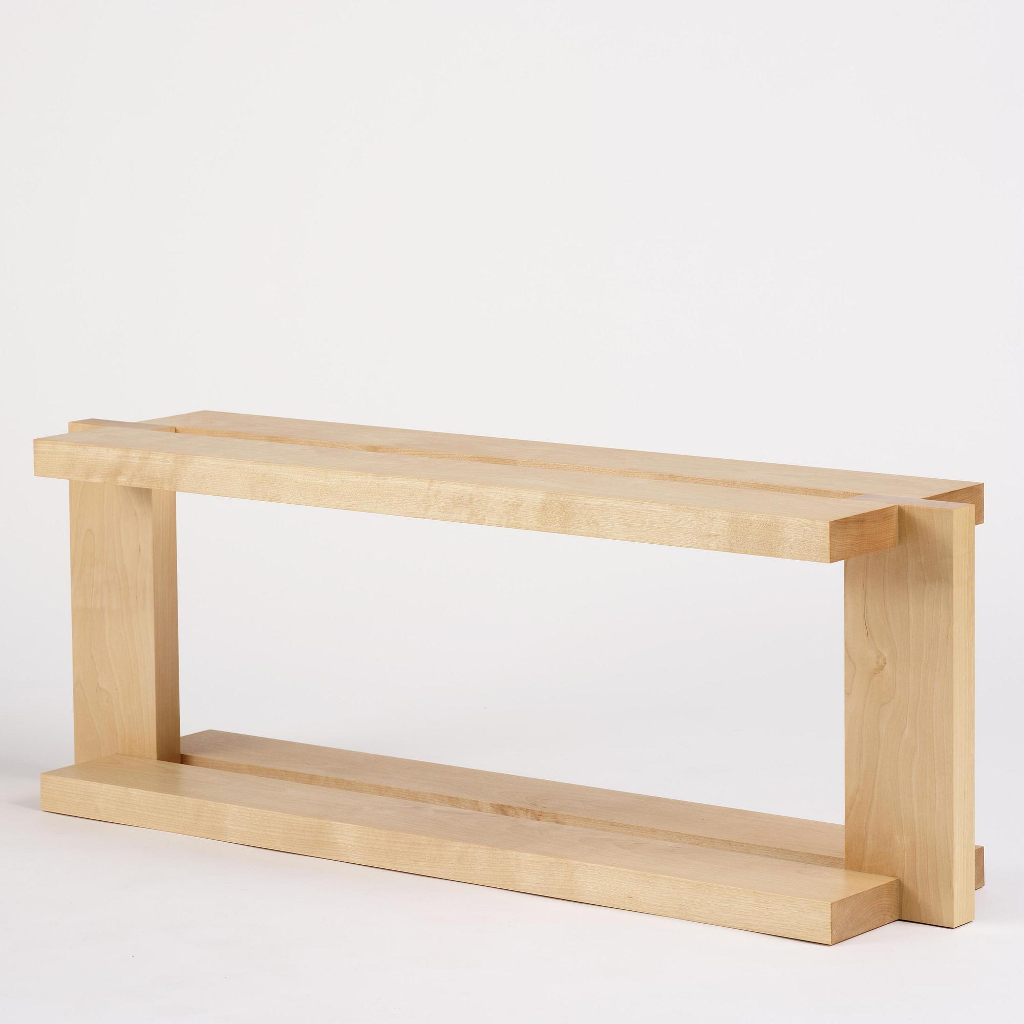 Nick Ross, an "Arrangement #16" coffe table/bench, executed in his studio, Stockholm, 2024.