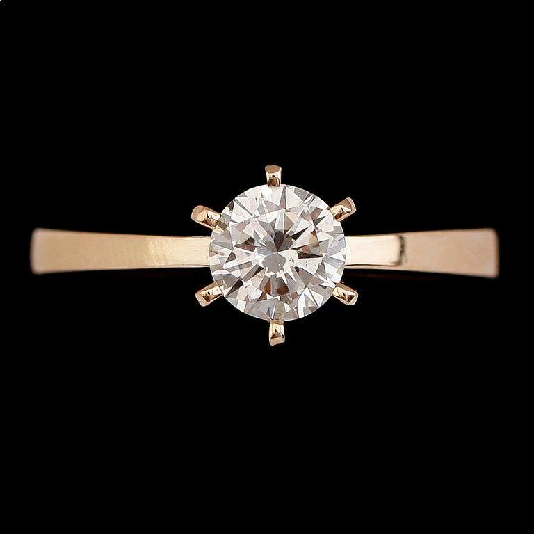 RING, 18 k guld, briljantslipad diamanter ca 0.77 ct. Vikt ca 4,3 g.