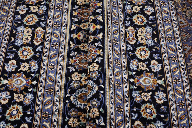A carpet, Kashan, ca 420 x 296 cm.