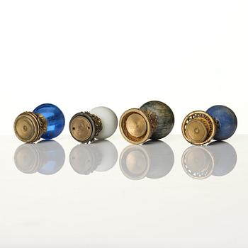 A group of 11 various 'official's hat' finials, Qing dynasty, 19th century.