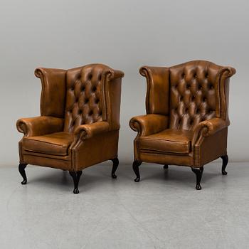 A pair of second half of the 20th century chesterfield model easy chairs.