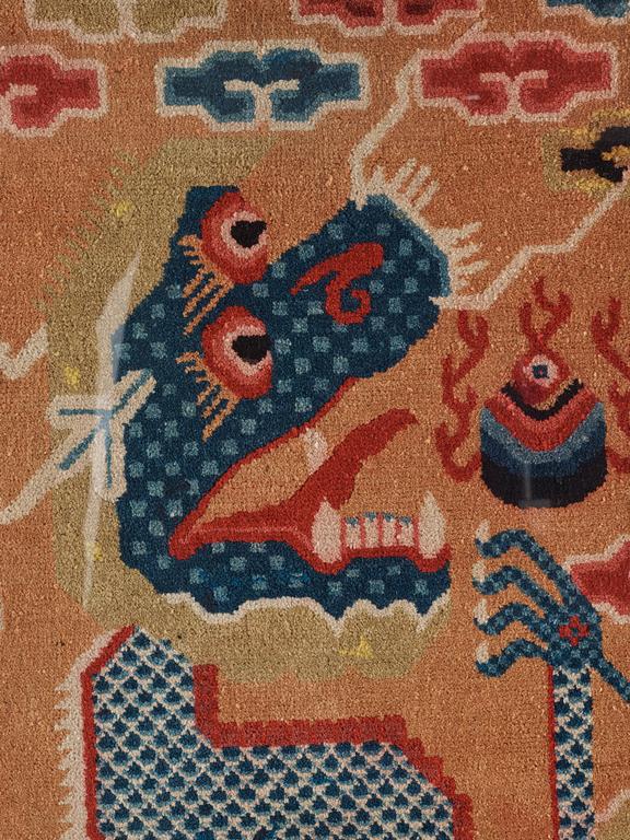 PILLAR RUG, FRAGMENT. Framed. Semi-antique China. 123 x 66 cm (with the frame 151 x 87,5 cm).