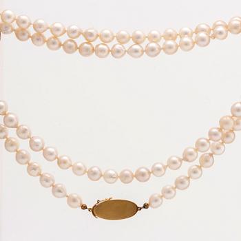 PÄRLCOLLIER odlade pärlor ca 7,5 mm lås i 18K guld , längd ca 85 cm.