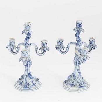 A pair of rococo style porcelain candelabras, Meissen, Germany, early 20th century.