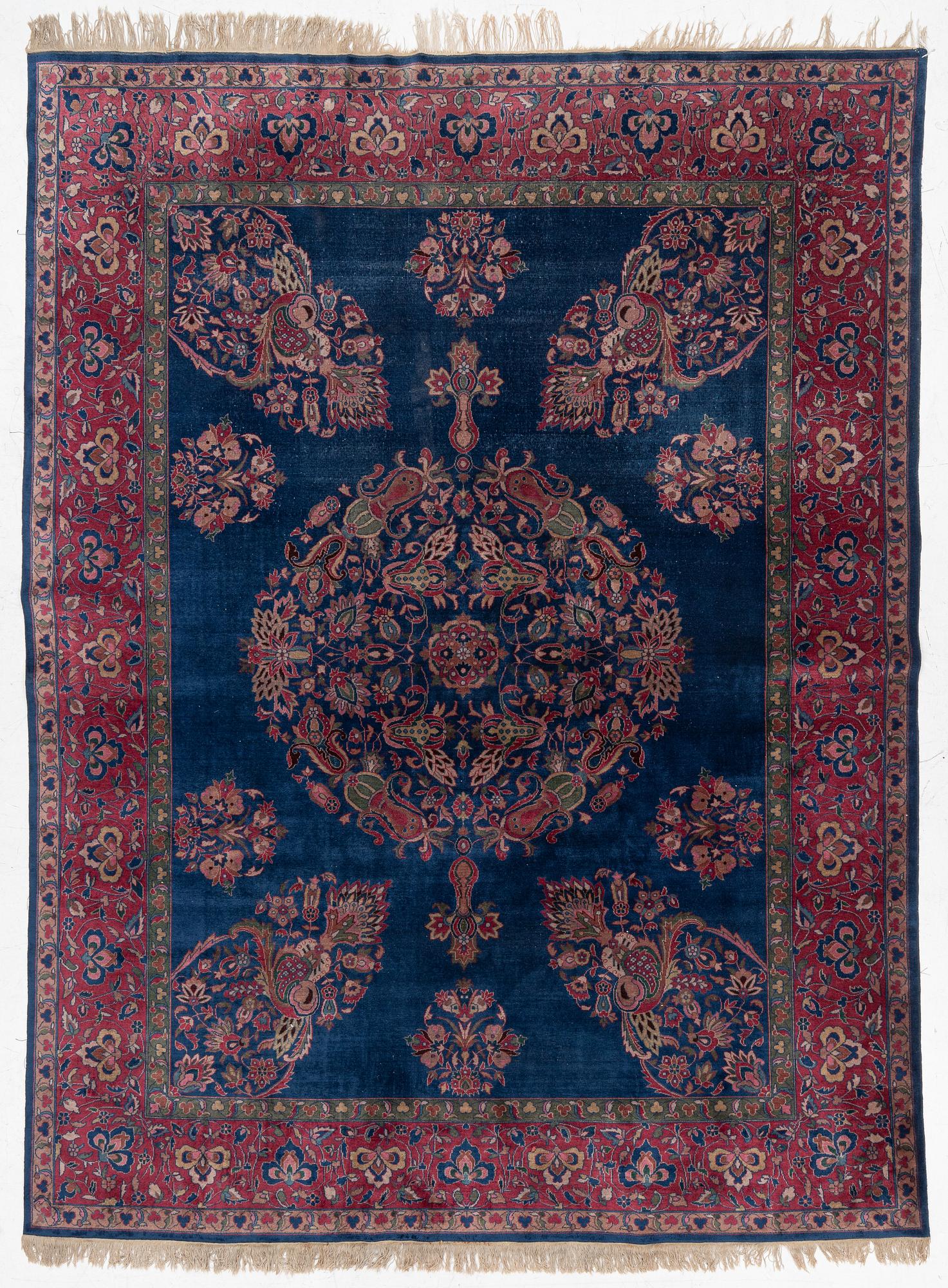 A semi-antique Amritsar carpet, north India c. 359 x 272 cm.
