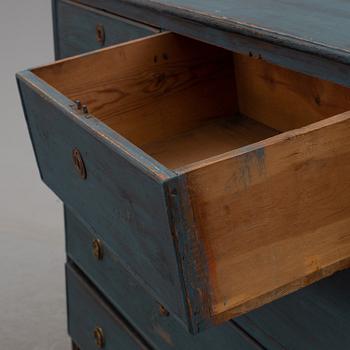 a chest of drawers from the 19th century.