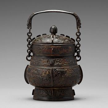 An archaistic bronze vessel of You shape, Ming dynasty or older.