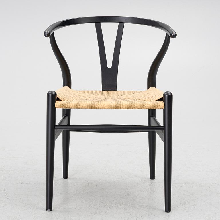 Hans J. Wegner, a model CH-24/'Wishbone' chair, Carl Hansen, Denmark, 21st century.