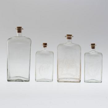 Four brandy bottles, 19/20th century.