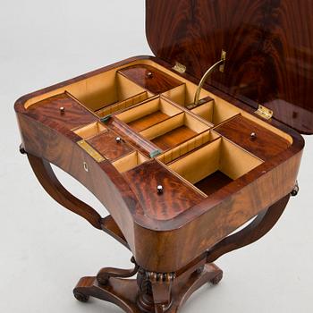 A sewing table from the first half of the 19th century.