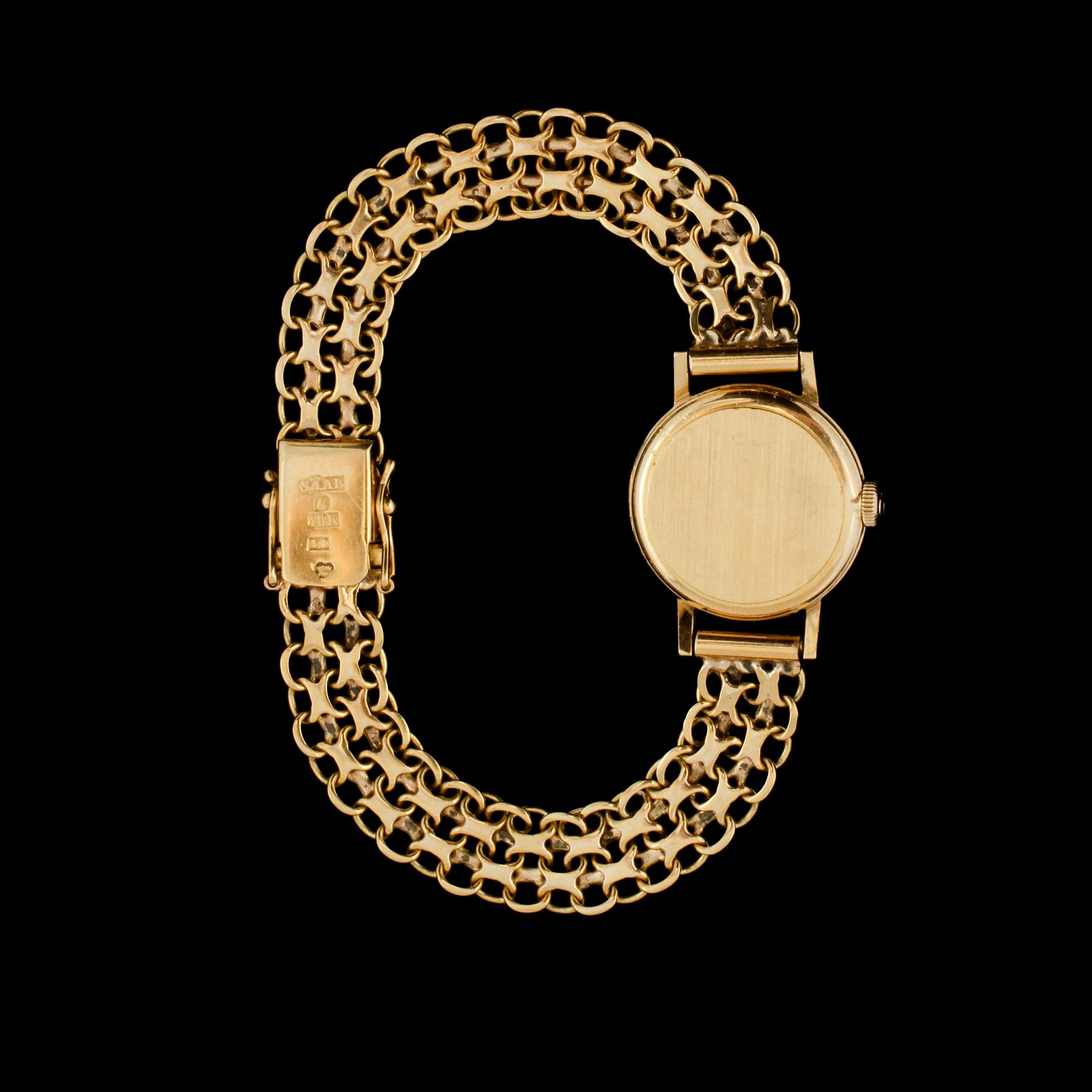 ARMBANDSUR, 18K guld, Omega, armlänk stämplad Stockholms Ädelsmide, 1973. Vikt 22,1 g.