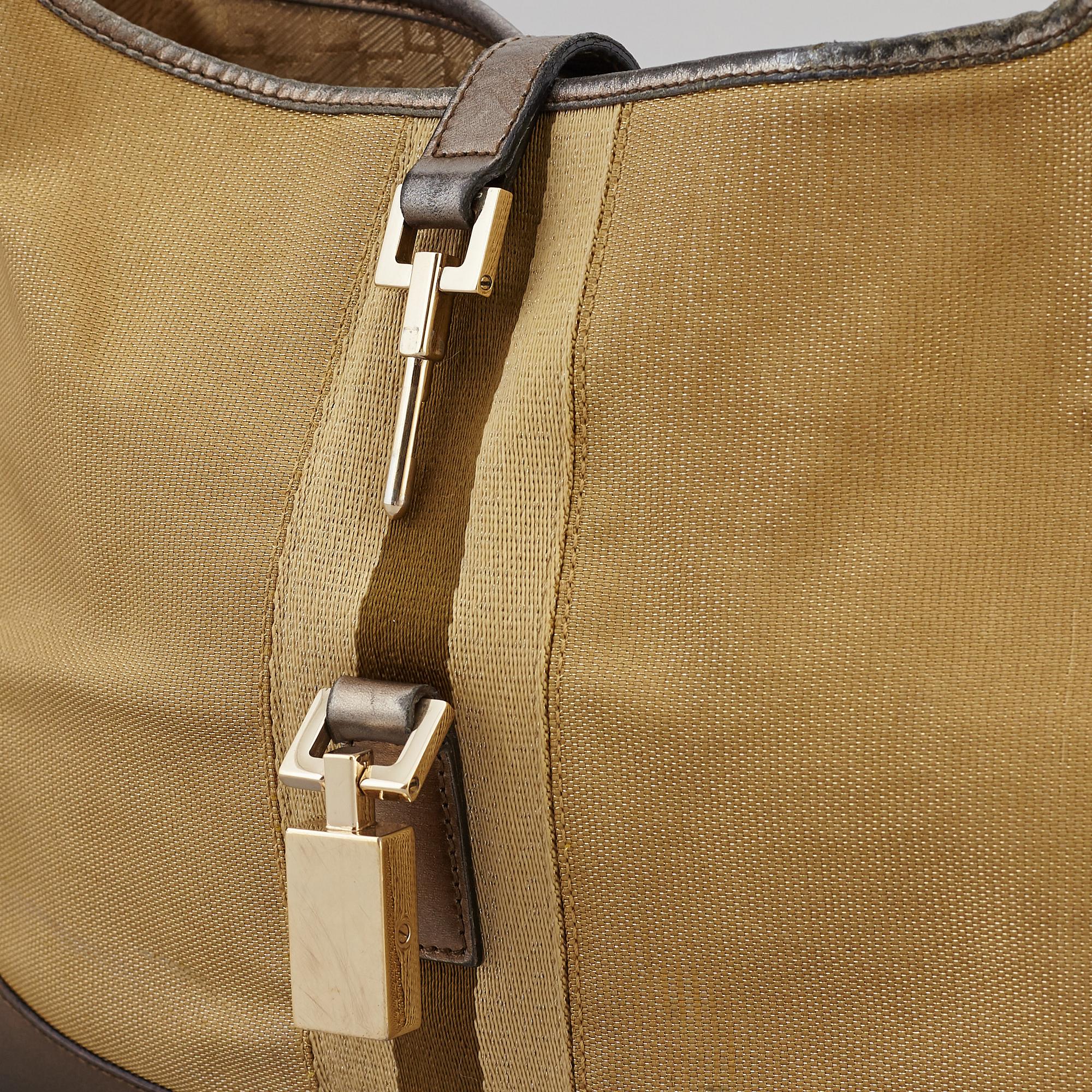 GUCCI, a metallic bag.