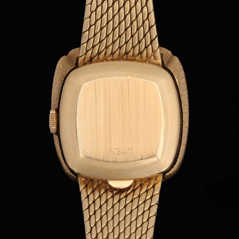 A Rolex gold and brilliant cut diamond watch, tot. app. 0.30 cts.