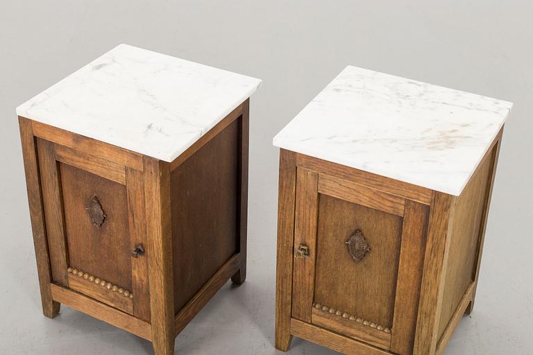 A PAIR OF BEDSIDE TABLES.