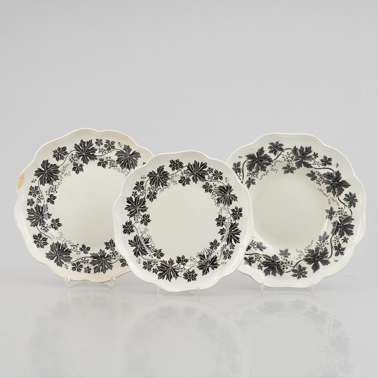 Arthur Percy, 57 pieces of a "Vinranka" creamware service, Gefle, Sweden, first half of the 20th century.