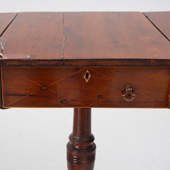 A pair of tables, England, early 19th century.