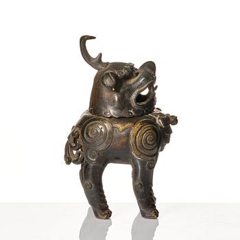 A bronze censer in the shape of a buddhist lion, Ming dynasty (1368-1644).