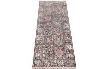 A Kashmir runner carpet, silk, c. 364 x 97 cm.