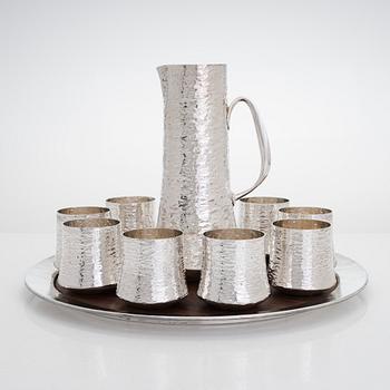 Tapio Wirkkala, silver pitcher with eight goblets on a rosewood tray, Kultakeskus, Hämeenlinna 1973 and 1976.