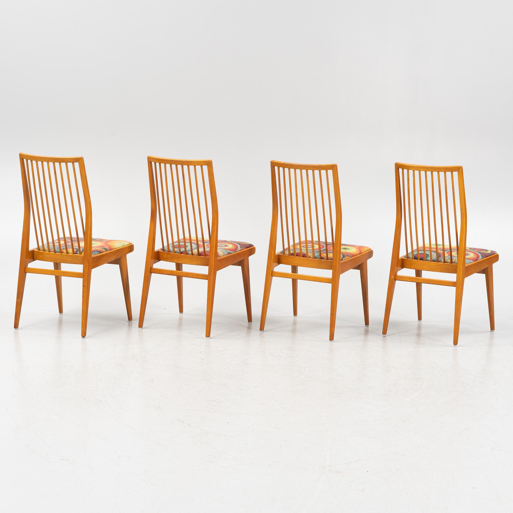 Four beech chairs, mid 20th Century.