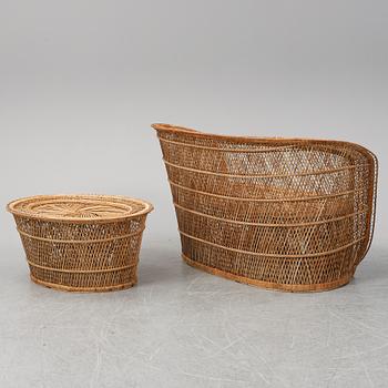 A late 20th Century rattan sofa with table.