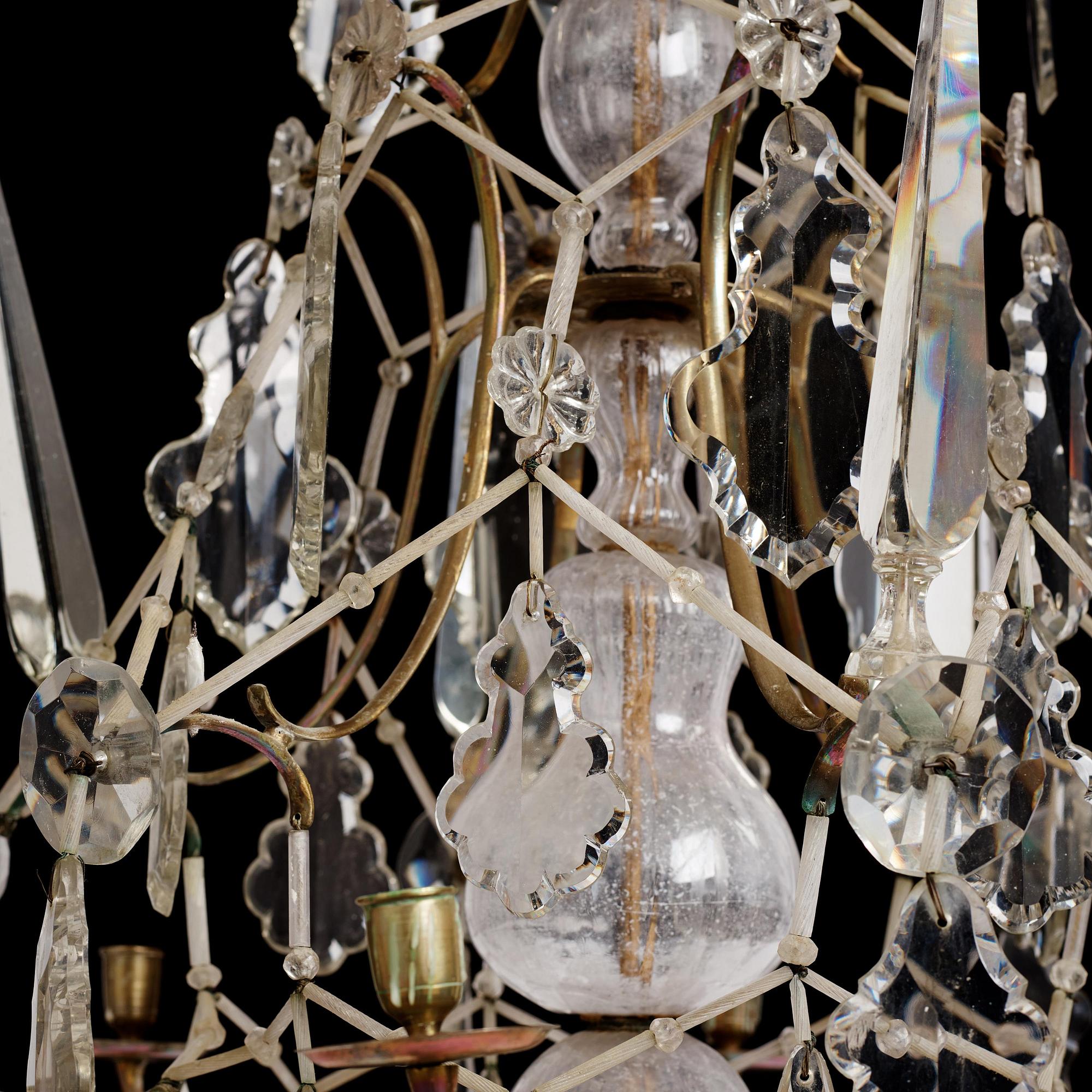 A Swedish rococo gilt-brass and cut glass six-branch chandelier by O. Westerberg (master in Stockholm 1769-1811).