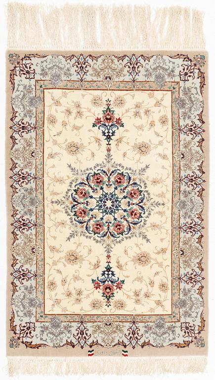 A part silk Isfahan rug, signed, c. 125 x 84 cm.