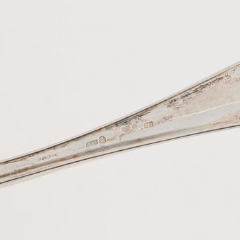 Bestickuppsättning, silver, 59 delar, "Svensk Spets", mestadels KG Markströms Guldsmed AB, 1916-1931.