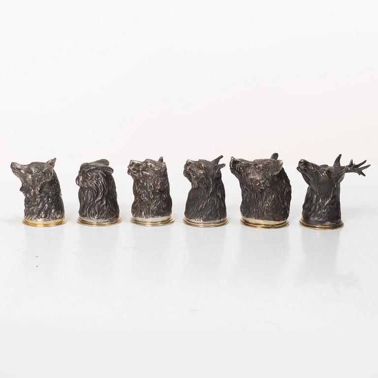 Six Russian parcel-gilt silver animal's head stirrup cups, including with mark of Nikols & Plinke, St. Petersburg.