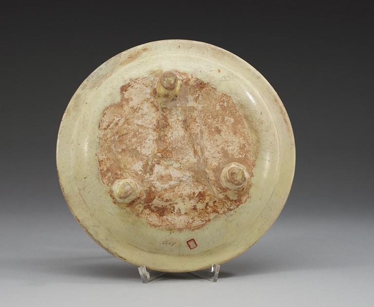 A sancai glazed tripod dish, Tang dynasty, (618-907 AD.).