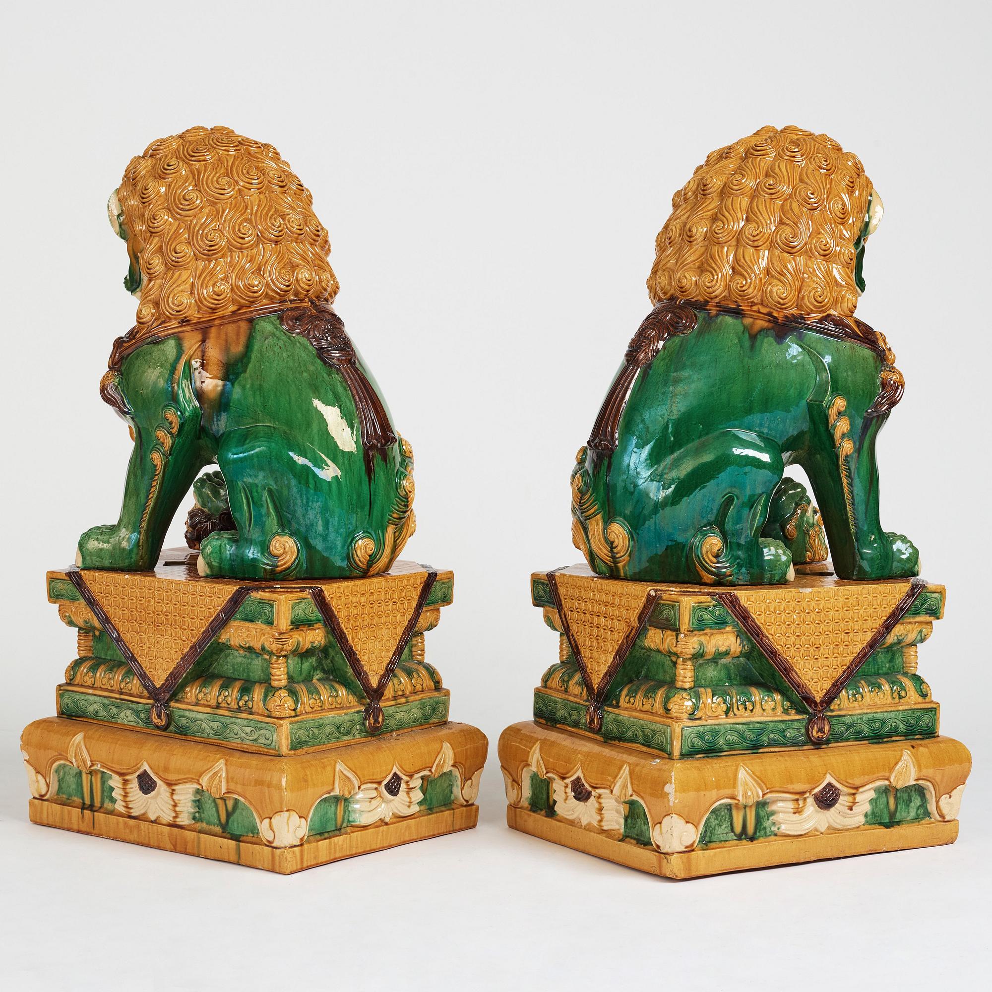 A pair of large buddhist lions, early 20th Century.
