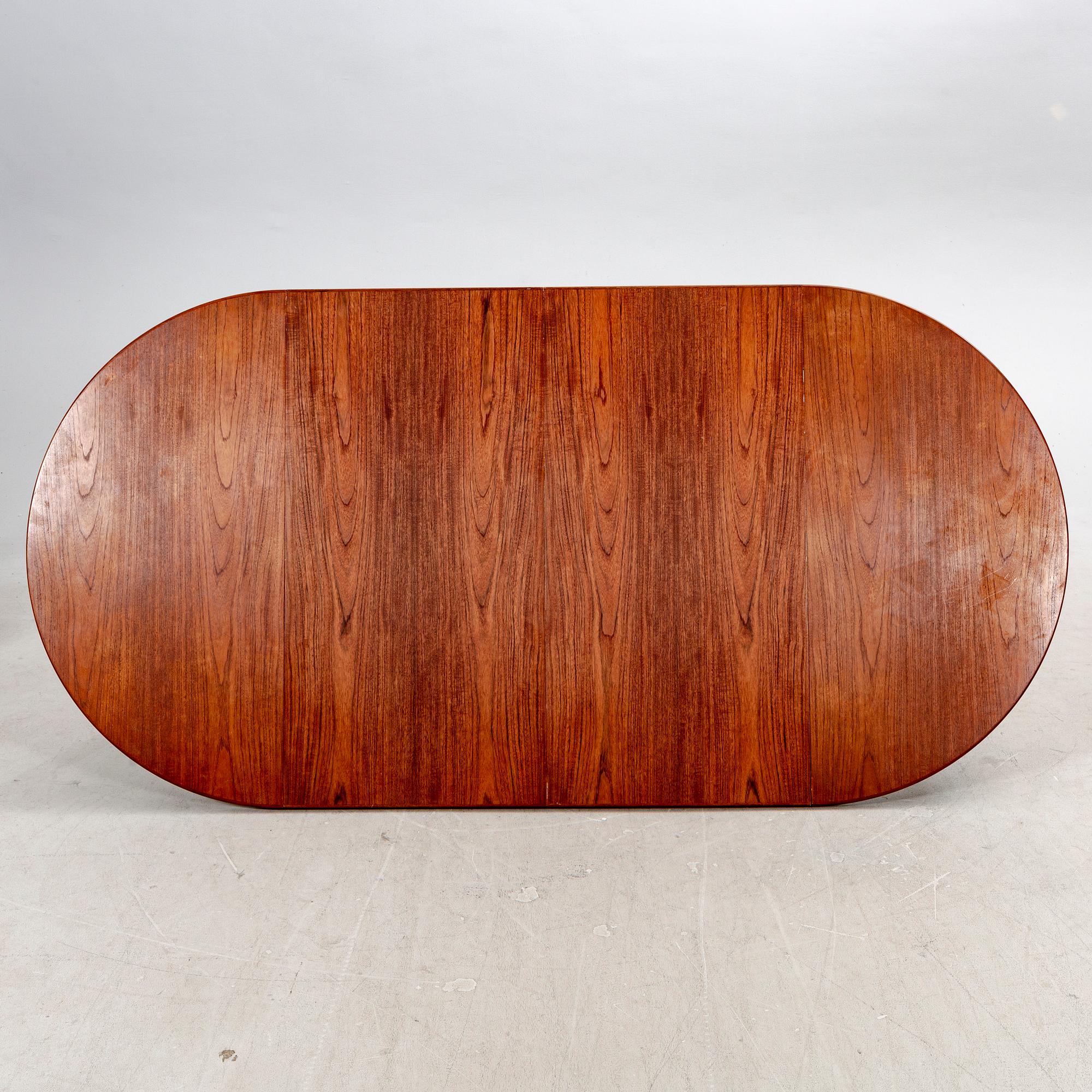 A mid 1900s fice pcs teak dining set.
