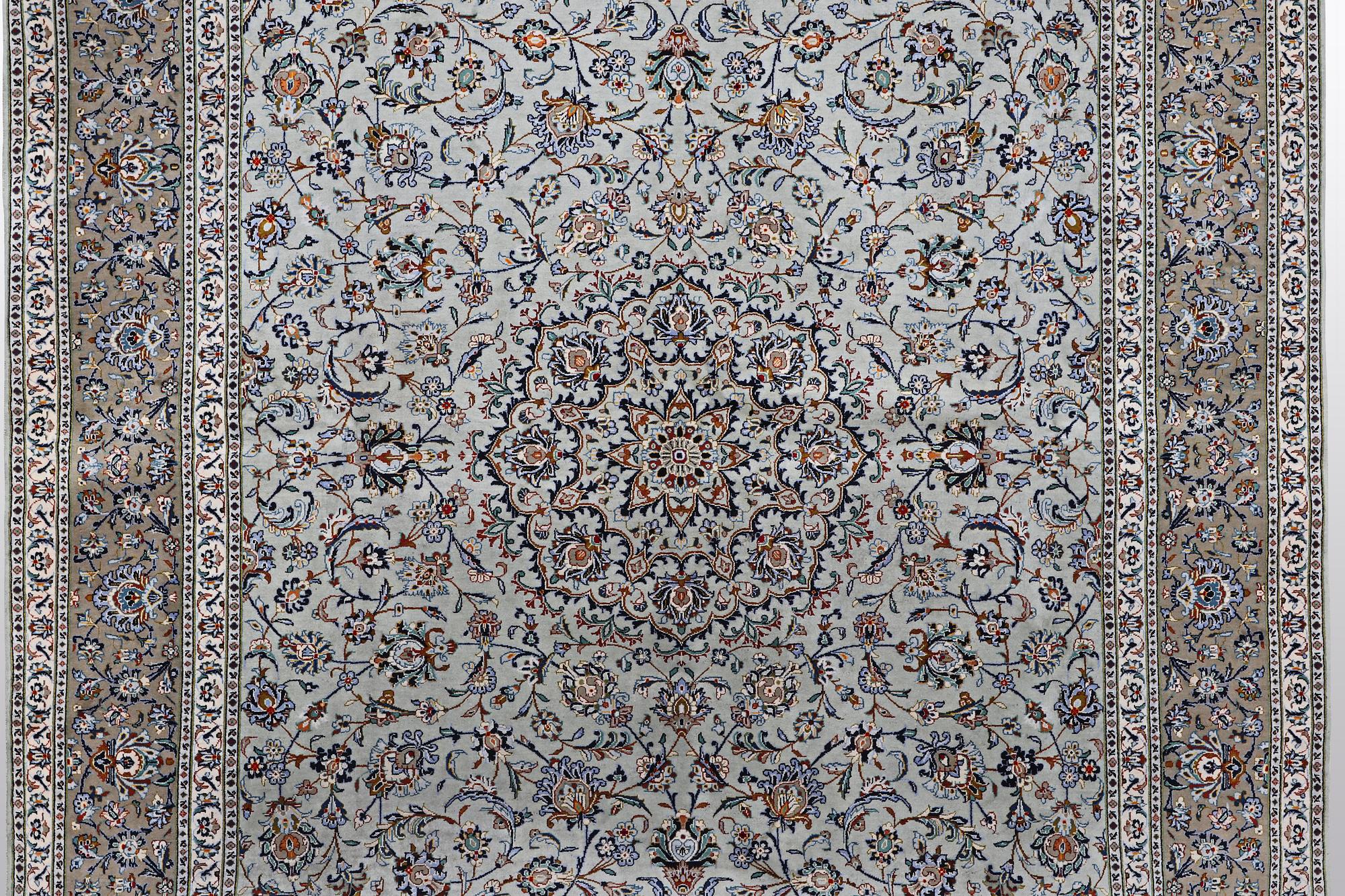 A carpet, Kashan, signed Fani, ca 420 x 300 cm.