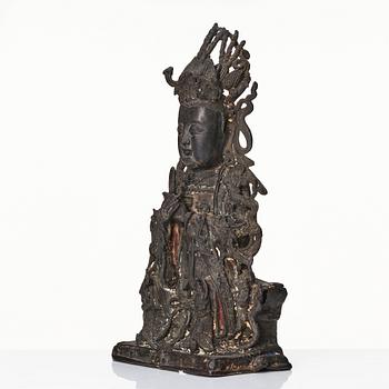 A bronze scultpure of Guanyin, Ming dynasty (1368-1644).