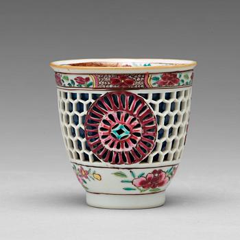 553. A famille rose and powder blue "devils work" cup, Qing dynasty, Qianlong (1736-95).