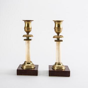 A pair of late empire  candlesticks, ca 1850.