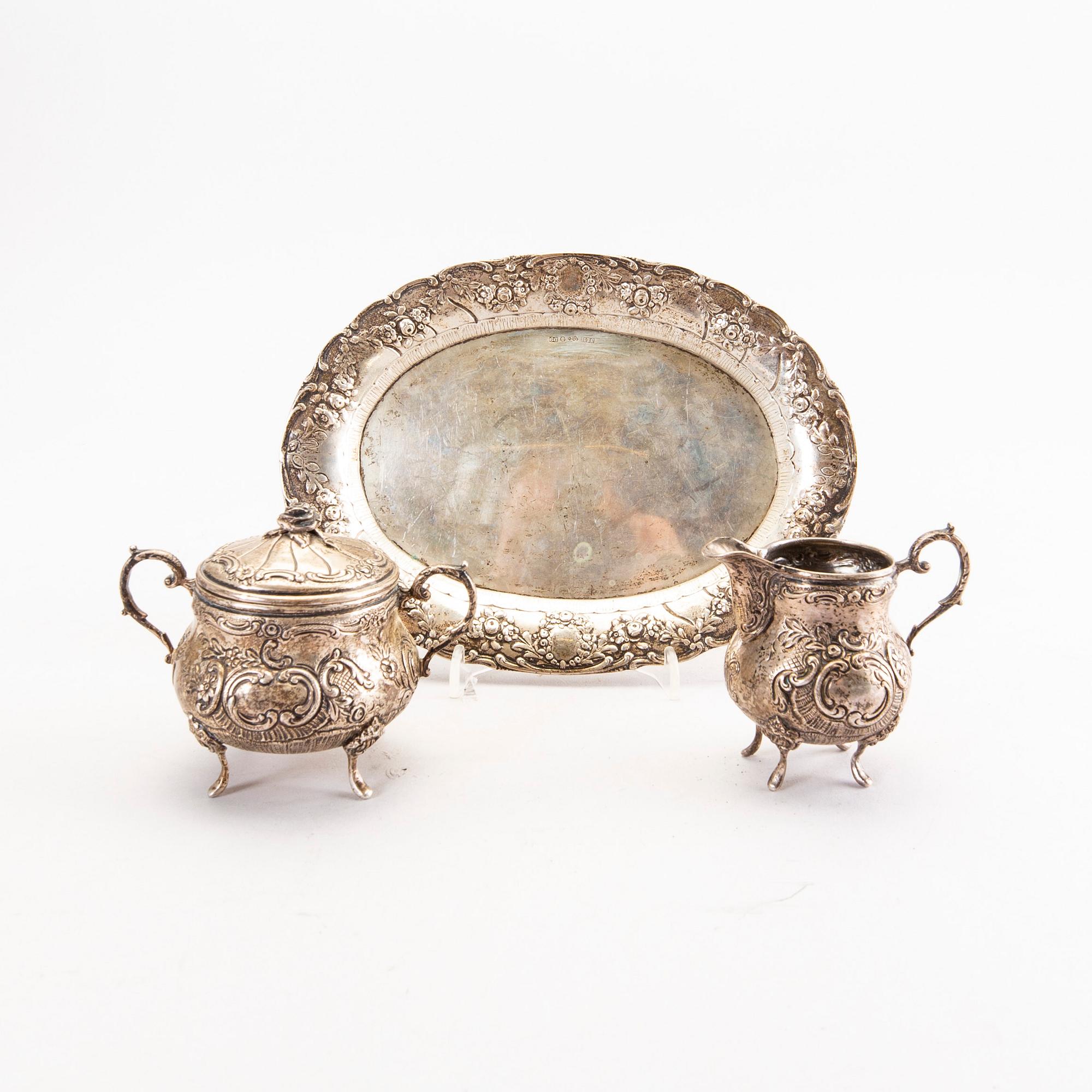A Swedish 20th century set of three pcs of creamer and sugar-bowl, mark of JL Hultman Stockholm 1954, total weight 422 g.