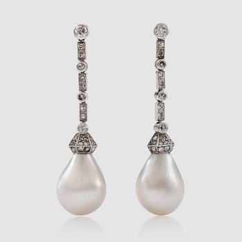 1248. A pair of pear shaped probably oriental natural pearl and old-cut diamond earrings. Total carat weight 0.50 cts.