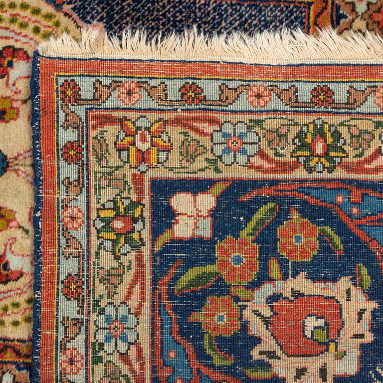 A carpet, semi-antique, Tabriz, signed Seylabi, ca 355 x 278 cm.