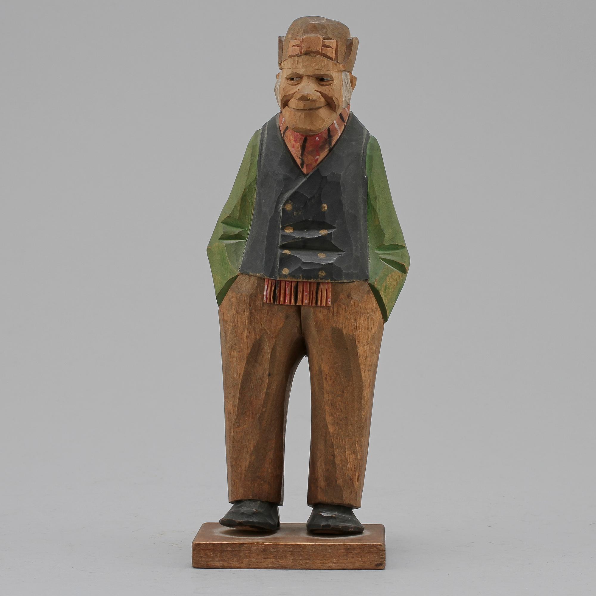 FIGURIN, trä, sign Lorens Larsson o dat 1943.