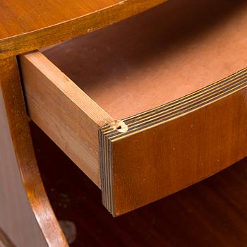 A pair of 20th century bedside tables.